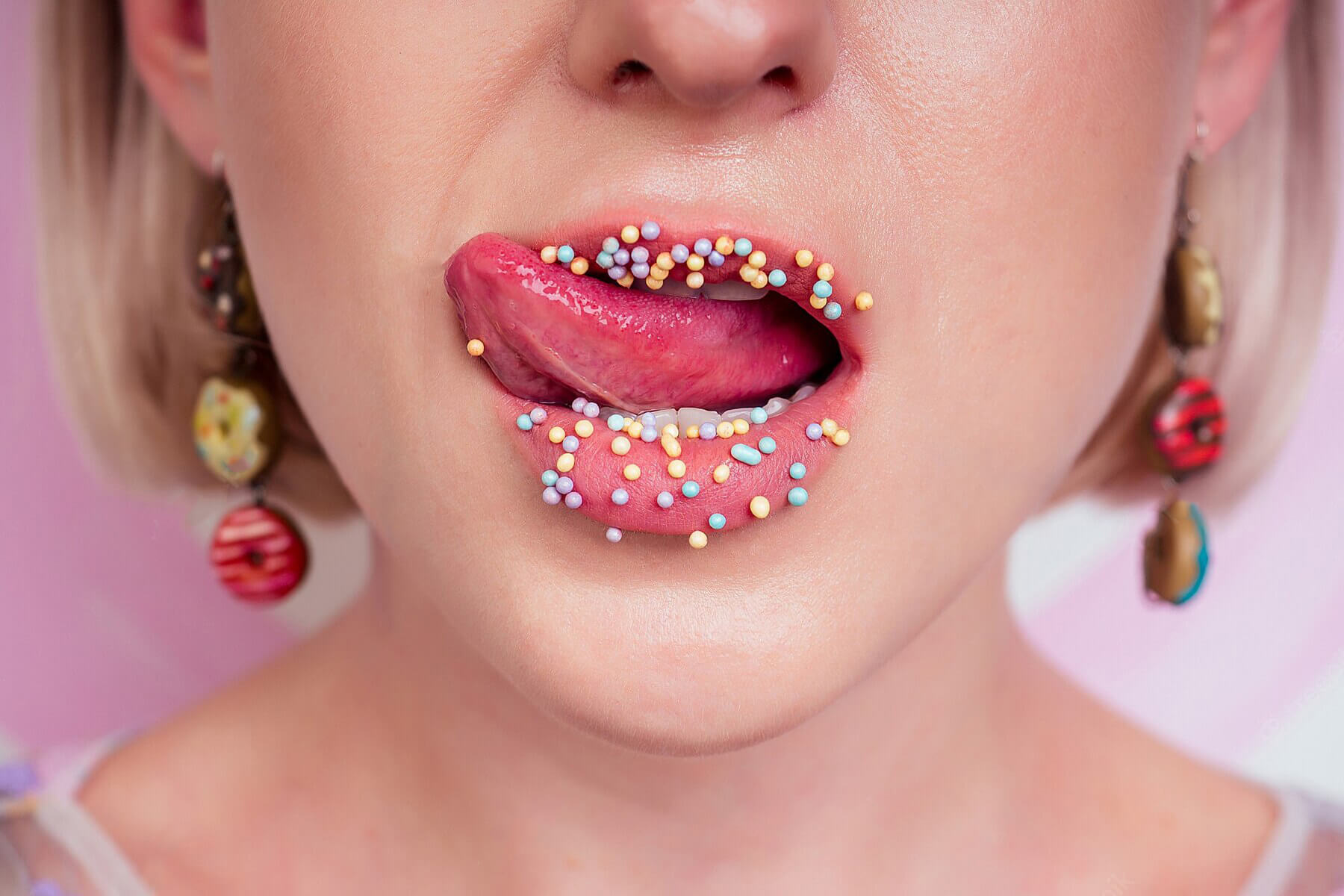 Portrait Beautiful Blonde Barbie Woman Perfect Makeup Tongue Sexy Licking Lip Donuts Earrings